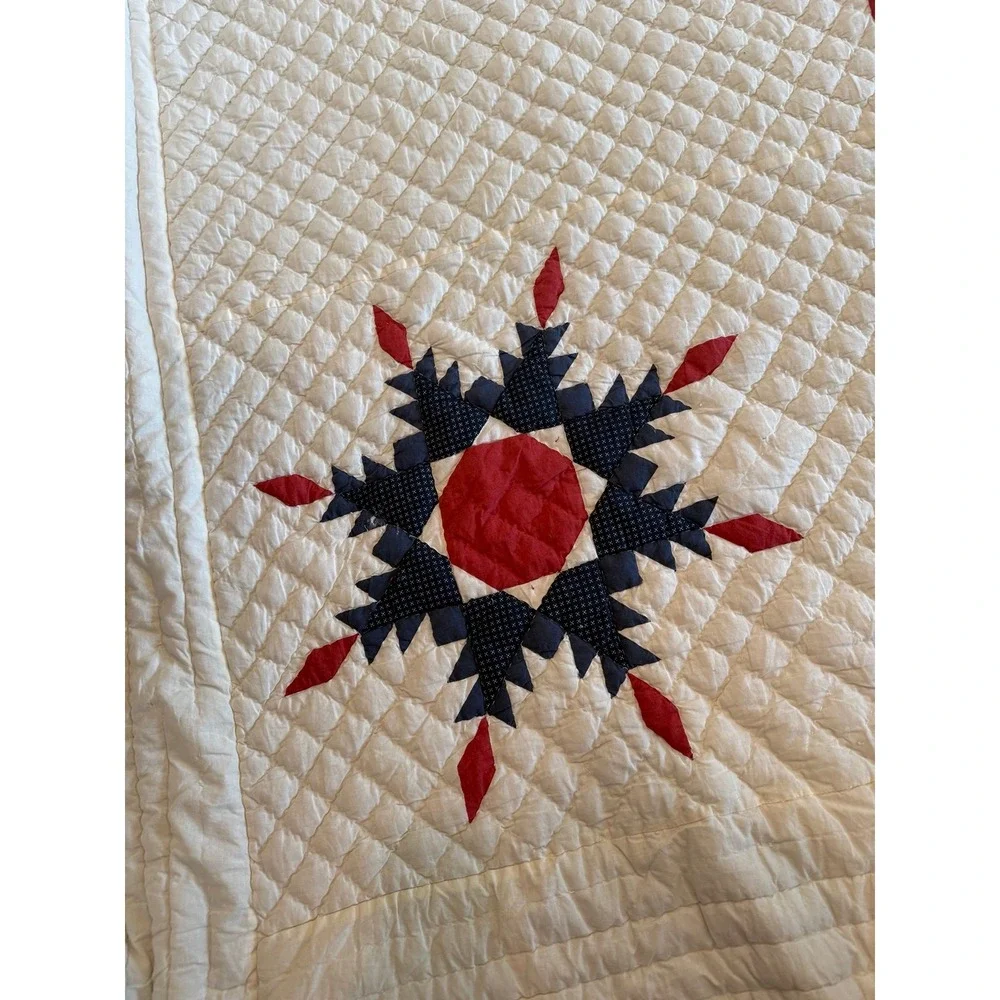 Large Snowflake quilt. In Americana colors. Hand sewn